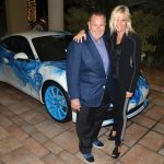 Raul de Molina and Daniela Wicki in front of showcased Champion Porsche’s 2014 Art Car