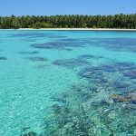 Turquoise water of the Caribbean sea with island