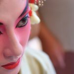 Florida-Grand-Opera_3804348-gold-mask-and-yellow-flower-on-a-piano