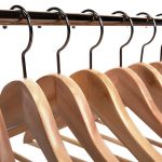 Green-Grass-on-Racks_7510673-wooden-clothes-hangers-on-a-white-isolated-background