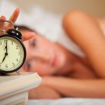 Snooze-Power_8806777-young-sleeping-woman-and-alarm-clock-in