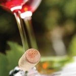 Page-4-WHOLE_1268171-red-wine-in-glasses-with-cork-on-corkscrew