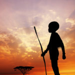 African child at sunset