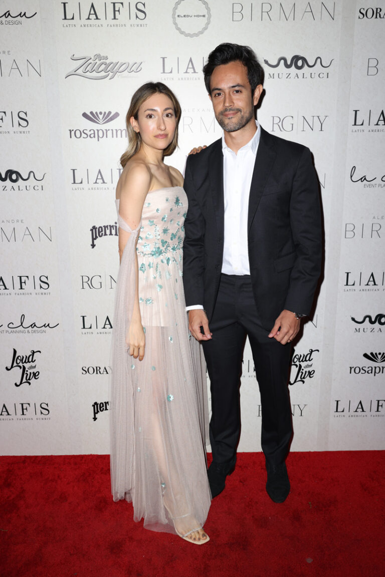 Gisele del Rio walks the red carpet w/ Guest