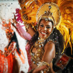 Feeling the beat. Cropped portrait of a beautiful samba dancer performing in a carnival with her band.