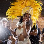 Shes got all the moves to light up the night. samba dancers performing in a carnival.