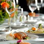 Delicious seafood main course with grilled fish and cream sauce