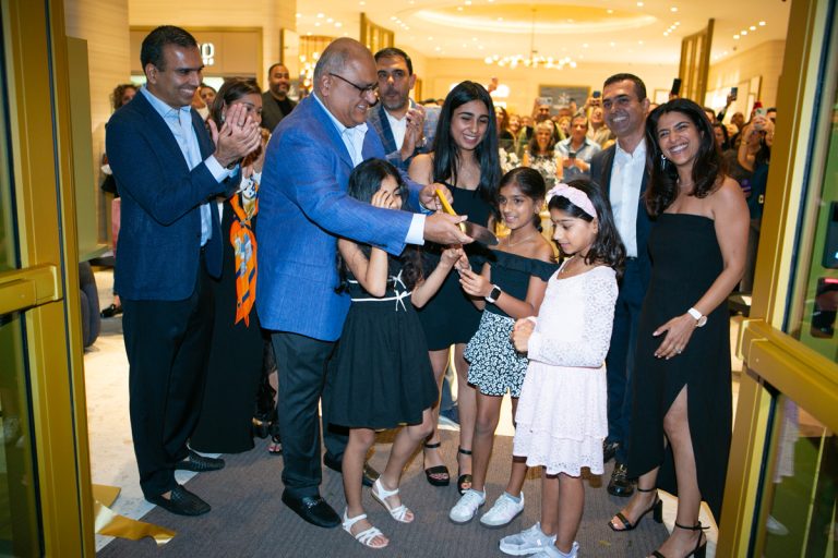 The Chugani Famiy celebrates the Grand Opening of Timeluxe